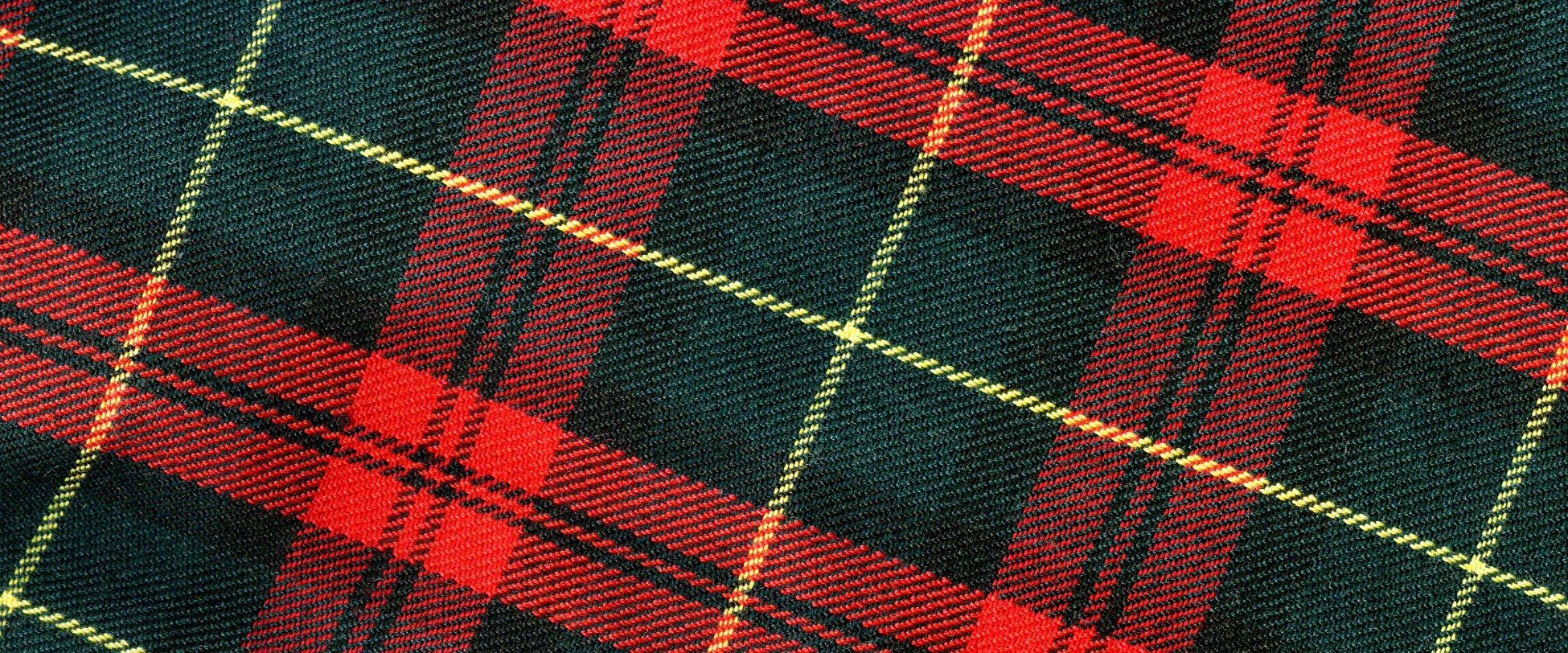 A close up shot of red and green tartan cloth.